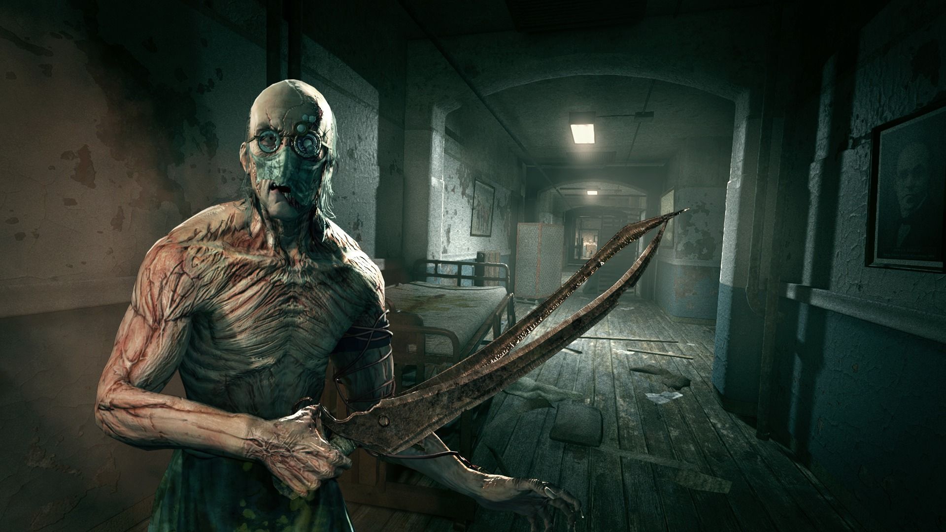 Un monstre écorché tient ddes ciseaux dans Outlast